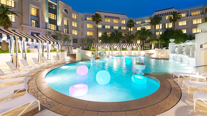 Visit Palm Garden Pool at Disney Ambassador Hotel for a splash of family fun this summer!